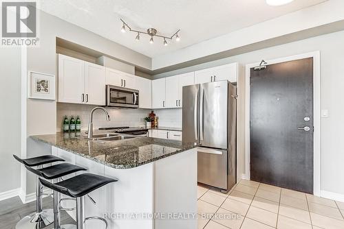 608 - 3504 Hurontario Street, Mississauga, ON - Indoor Photo Showing Kitchen With Double Sink With Upgraded Kitchen