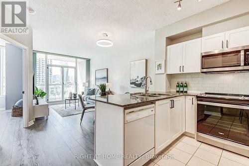 608 - 3504 Hurontario Street, Mississauga, ON - Indoor Photo Showing Kitchen With Double Sink