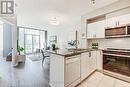 608 - 3504 Hurontario Street, Mississauga, ON  - Indoor Photo Showing Kitchen With Double Sink 