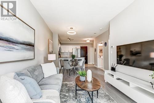 608 - 3504 Hurontario Street, Mississauga, ON - Indoor Photo Showing Living Room