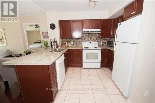 2007 - 335 Rathburn Road W, Mississauga, ON - Indoor Photo Showing Kitchen With Double Sink