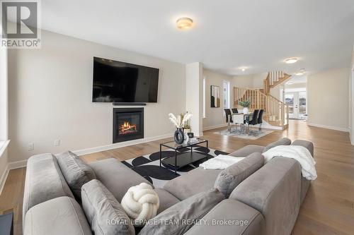 757 Gamble Drive, Russell, ON - Indoor Photo Showing Living Room With Fireplace