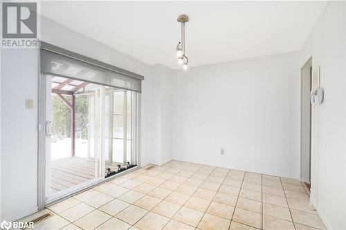 View of tiled empty room - 15 Oakington Place, Mississauga, ON - Indoor Photo Showing Other Room