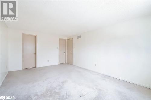 Unfurnished room with light carpet - 15 Oakington Place, Mississauga, ON - Indoor Photo Showing Other Room