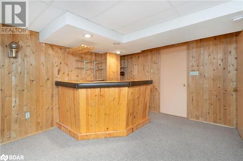 Bar featuring wood walls and light colored carpet - 15 Oakington Place, Mississauga, ON - Indoor Photo Showing Other Room