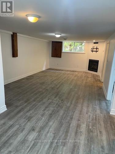 394073 County Road 12, Amaranth, ON - Indoor Photo Showing Other Room With Fireplace