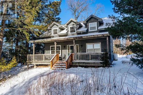 D - 1033 Carnegie Lane, Dysart Et Al, ON - Outdoor With Deck Patio Veranda With Facade