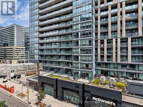 510 - 20 Joe Shuster Way, Toronto, ON - Outdoor With Balcony With Facade