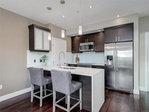 204-2589 Penrhyn St, Saanich, BC - Indoor Photo Showing Kitchen With Upgraded Kitchen