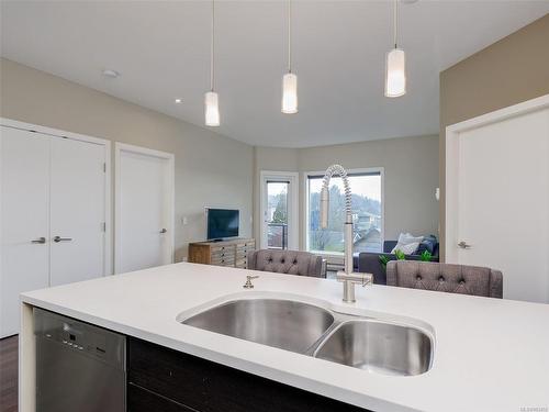 204-2589 Penrhyn St, Saanich, BC - Indoor Photo Showing Kitchen With Double Sink