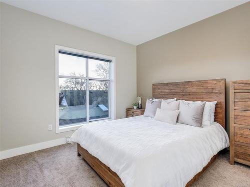 204-2589 Penrhyn St, Saanich, BC - Indoor Photo Showing Bedroom