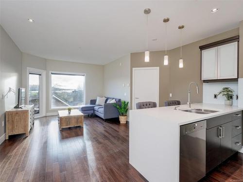 204-2589 Penrhyn St, Saanich, BC - Indoor Photo Showing Kitchen With Double Sink