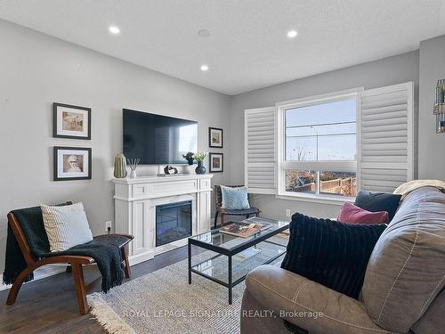 130 Bonspiel Dr, Toronto, ON - Indoor Photo Showing Living Room With Fireplace