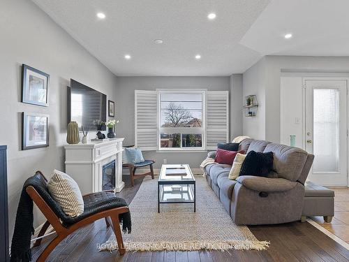 130 Bonspiel Dr, Toronto, ON - Indoor Photo Showing Living Room With Fireplace