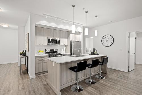 212-935 Academy Way, Kelowna, BC - Indoor Photo Showing Kitchen With Double Sink With Upgraded Kitchen