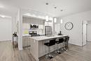 212-935 Academy Way, Kelowna, BC  - Indoor Photo Showing Kitchen With Double Sink With Upgraded Kitchen 