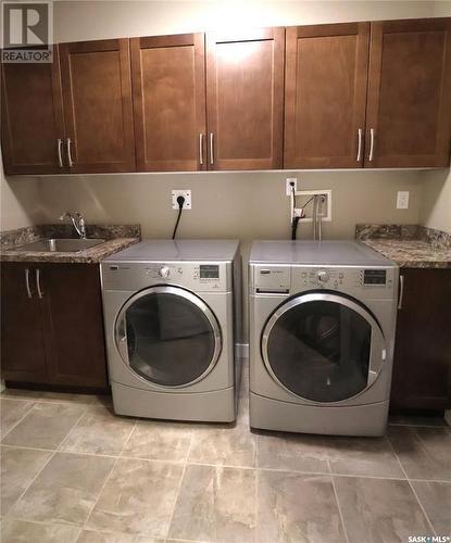 1006 2055 Rose Street, Regina, SK - Indoor Photo Showing Laundry Room