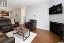 1006 2055 Rose Street, Regina, SK  - Indoor Photo Showing Living Room With Fireplace 