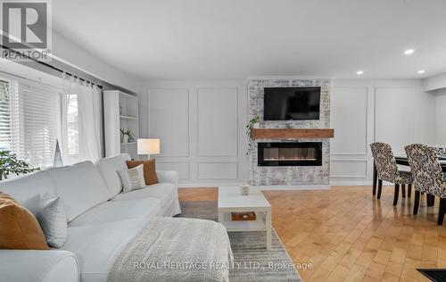 82 Springdale Crescent, Oshawa (Donevan), ON - Indoor Photo Showing Living Room With Fireplace