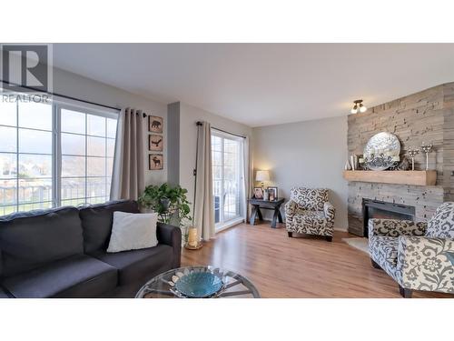 3145 Wilson Street Unit# 102, Penticton, BC - Indoor Photo Showing Living Room With Fireplace