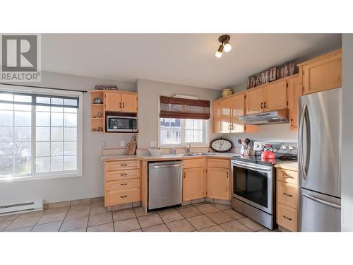 3145 Wilson Street Unit# 102, Penticton, BC - Indoor Photo Showing Kitchen With Double Sink