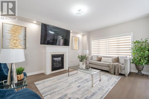 15 Faders Drive, Brampton, ON - Indoor Photo Showing Living Room With Fireplace