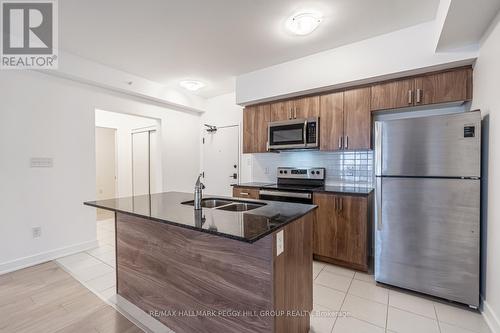 614 - 4 Spice Way, Barrie, ON - Indoor Photo Showing Kitchen With Double Sink With Upgraded Kitchen