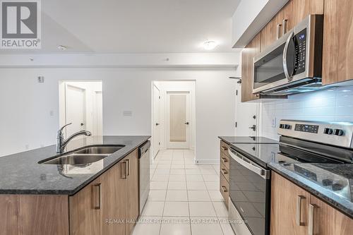 614 - 4 Spice Way, Barrie, ON - Indoor Photo Showing Kitchen With Double Sink