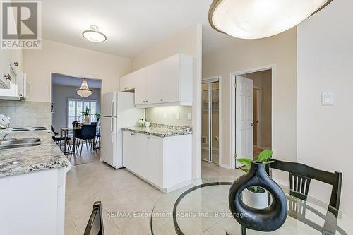 34 - 20 Kitty Murray Lane, Hamilton (Meadowlands), ON - Indoor Photo Showing Kitchen With Double Sink