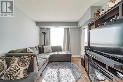 807 - 1720 Eglington Avenue E, Toronto, ON - Indoor Photo Showing Living Room