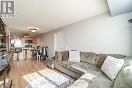 807 - 1720 Eglington Avenue E, Toronto, ON - Indoor Photo Showing Living Room