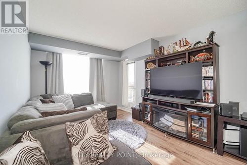 807 - 1720 Eglington Avenue E, Toronto, ON - Indoor Photo Showing Living Room