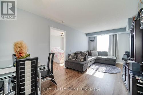 807 - 1720 Eglington Avenue E, Toronto, ON - Indoor Photo Showing Living Room