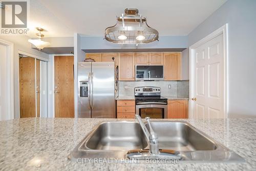 807 - 1720 Eglington Avenue E, Toronto, ON - Indoor Photo Showing Kitchen With Double Sink