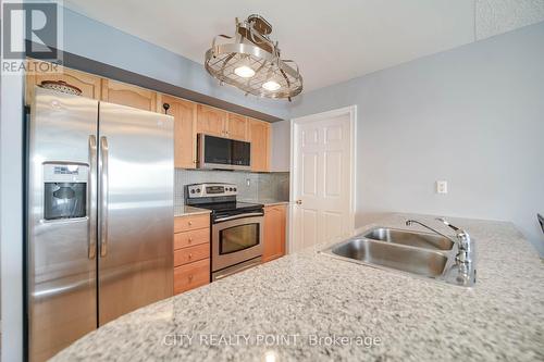 807 - 1720 Eglington Avenue E, Toronto, ON - Indoor Photo Showing Kitchen With Double Sink