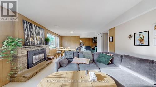 15 Foxwarren Drive, Toronto, ON - Indoor Photo Showing Living Room With Fireplace