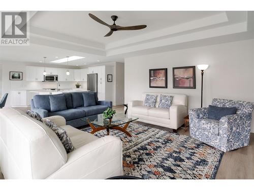 Premium new flooring in all living areas - 2365 Stillingfleet Road Unit# 360, Kelowna, BC - Indoor Photo Showing Living Room