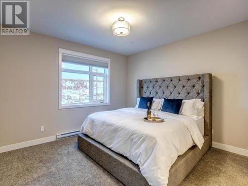 105-38 Waterfront Place, Whitehorse, YT - Indoor Photo Showing Bedroom