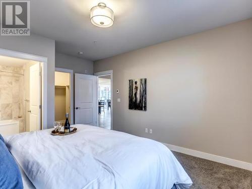 105-38 Waterfront Place, Whitehorse, YT - Indoor Photo Showing Bedroom