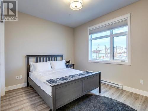 105-38 Waterfront Place, Whitehorse, YT - Indoor Photo Showing Bedroom