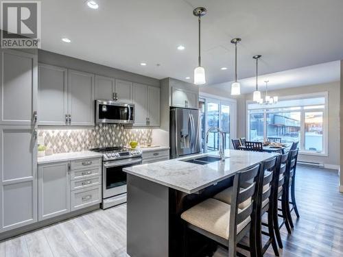 105-38 Waterfront Place, Whitehorse, YT - Indoor Photo Showing Kitchen With Double Sink With Upgraded Kitchen