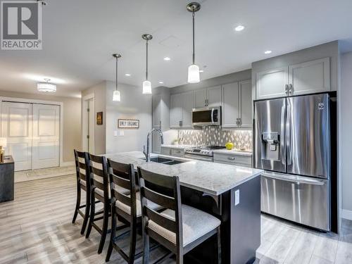 105-38 Waterfront Place, Whitehorse, YT - Indoor Photo Showing Kitchen With Double Sink With Upgraded Kitchen