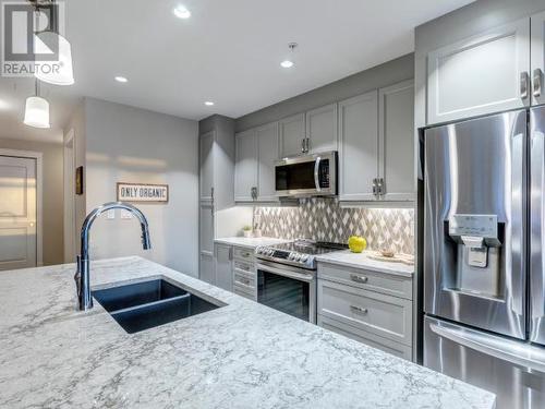 105-38 Waterfront Place, Whitehorse, YT - Indoor Photo Showing Kitchen With Double Sink With Upgraded Kitchen