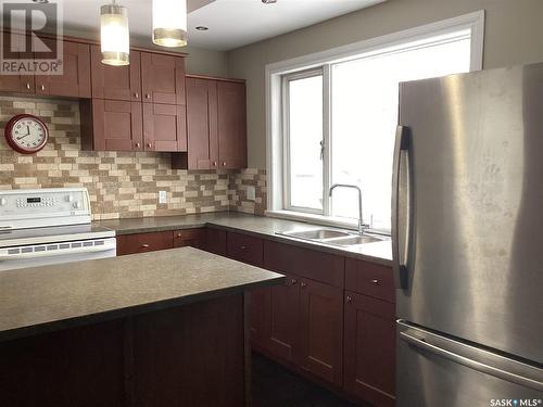 508 Osler Street, Regina, SK - Indoor Photo Showing Kitchen With Double Sink