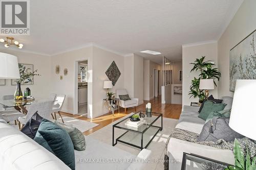 16 Shaddock Crescent, Toronto, ON - Indoor Photo Showing Living Room