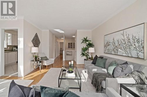 16 Shaddock Crescent, Toronto, ON - Indoor Photo Showing Living Room