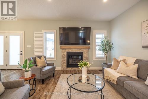 430 Keeso Lane, North Perth (32 - Listowel), ON - Indoor Photo Showing Living Room With Fireplace