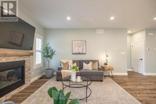 430 Keeso Lane, North Perth (32 - Listowel), ON - Indoor Photo Showing Living Room With Fireplace