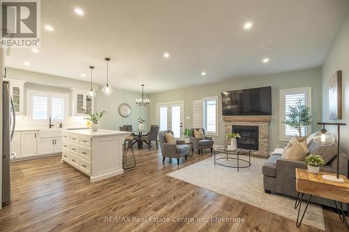 430 Keeso Lane, North Perth (32 - Listowel), ON - Indoor Photo Showing Living Room With Fireplace