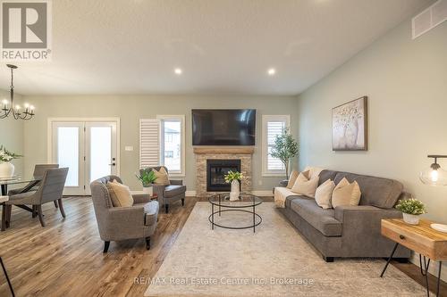 430 Keeso Lane, North Perth (32 - Listowel), ON - Indoor Photo Showing Living Room With Fireplace